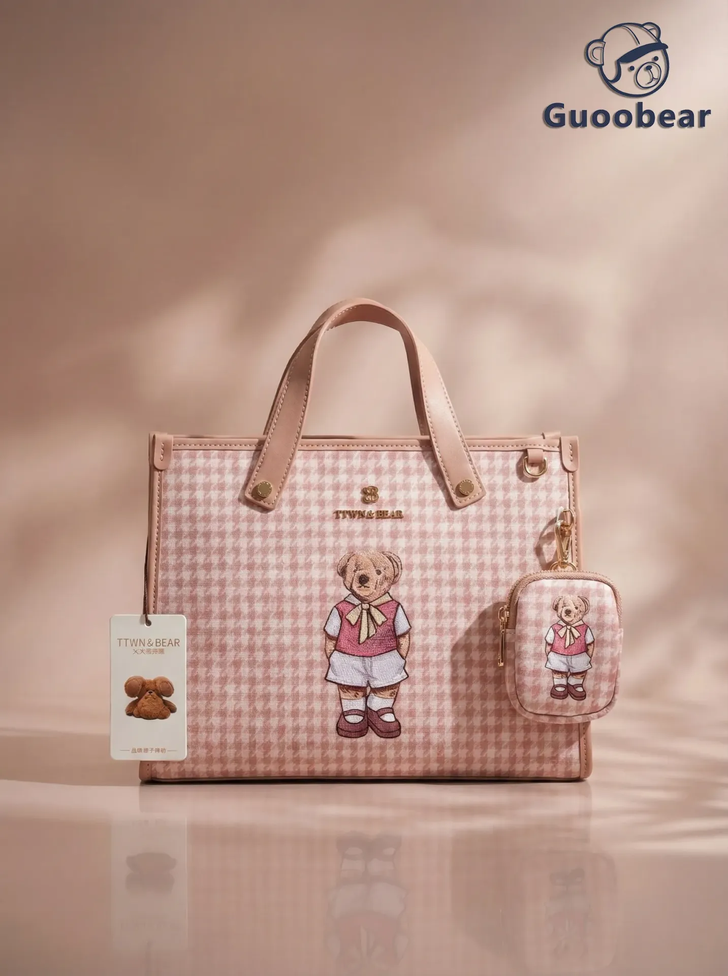 Pink houndstooth handbag